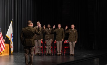 ROTC cadets in the class of 2024 take the Oath of Office commissioning them as 2nd lieutenants in the U.S. Army.