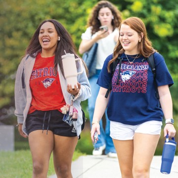 Students walk to class on campus. 