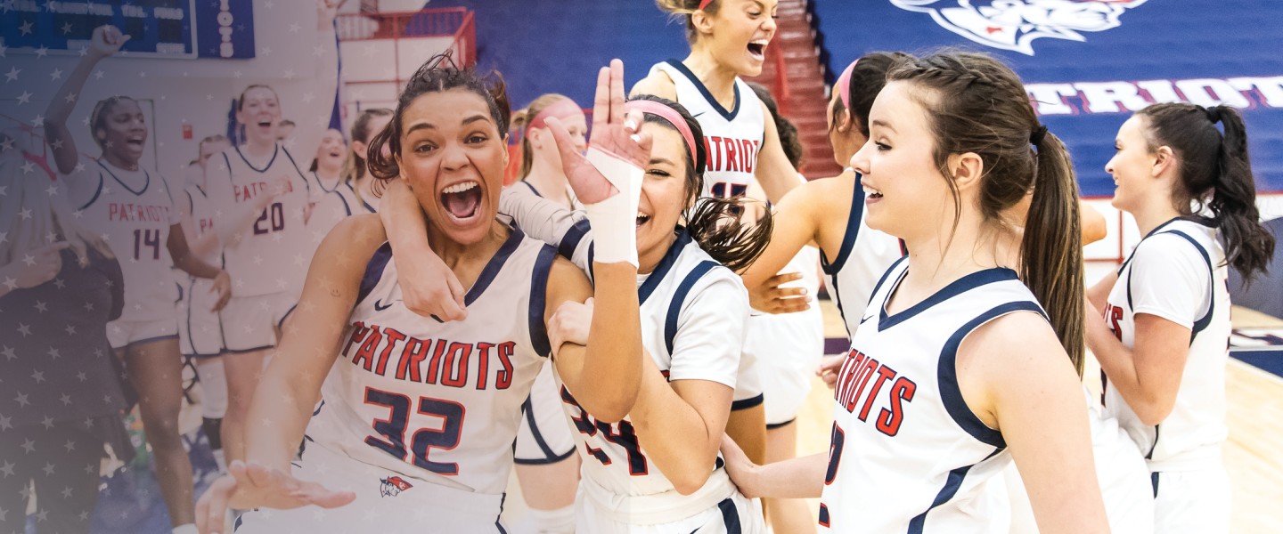 Students on the women's basketball team celebrate following a win. 