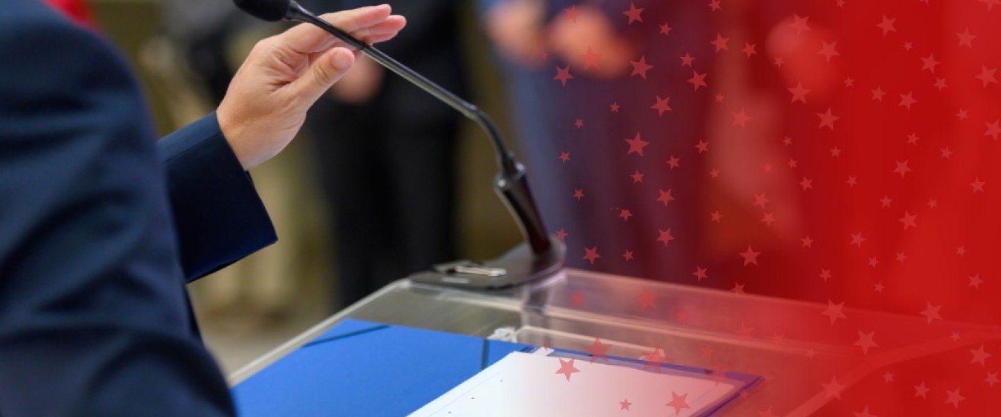 Political Science Student at Podium